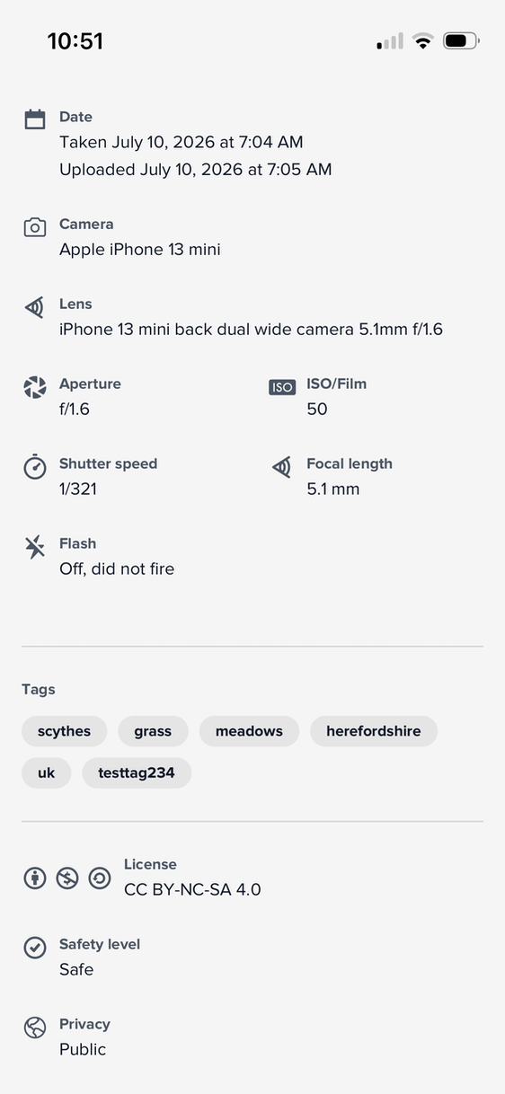 A screenshot of the app shoing information about a photo, such as its dates, camera info, license, etc. It also shows the tags, which are all lowercase, including 'herefordshire' and 'testtag234'.